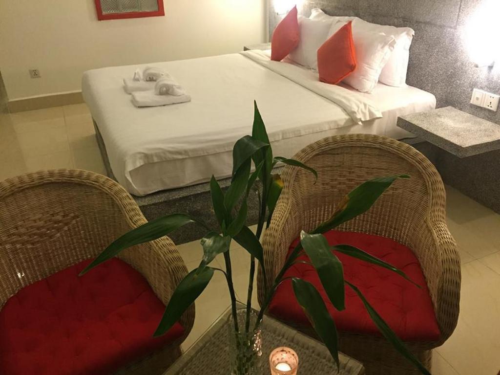 K9 Riverside Hotel Phnom Penh Quarto foto