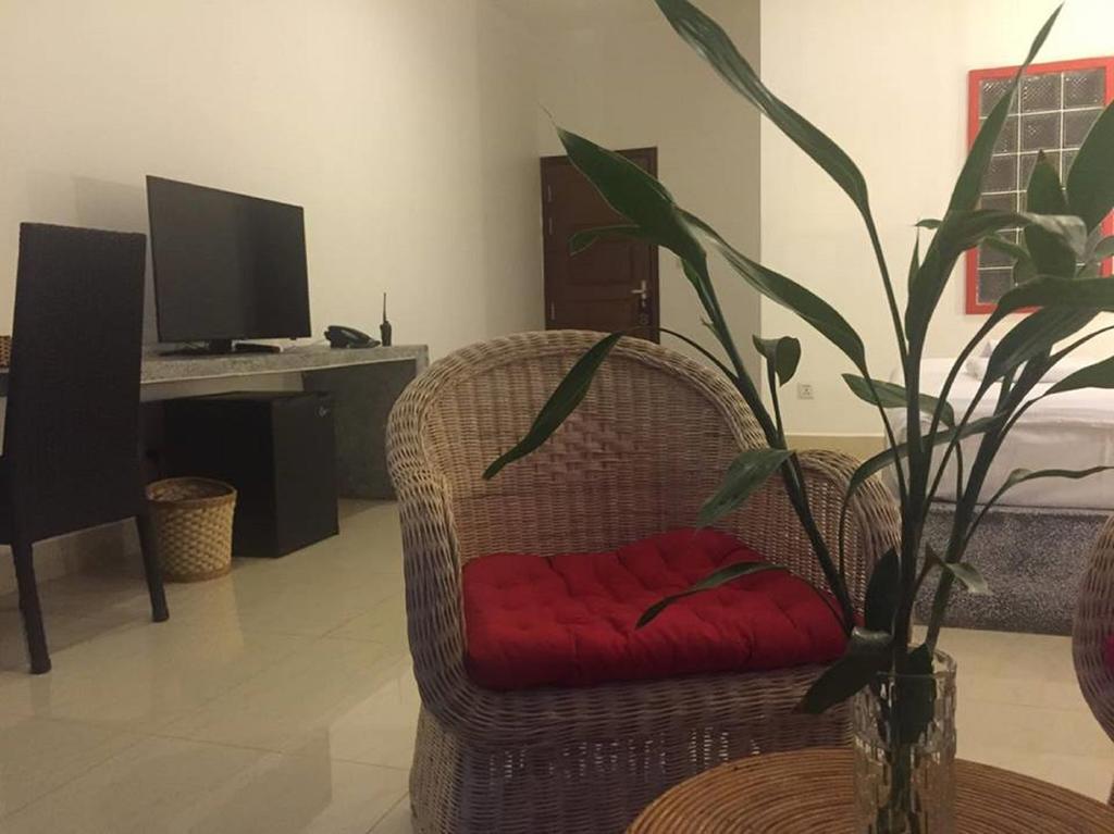 K9 Riverside Hotel Phnom Penh Quarto foto
